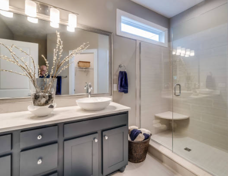 Entryway styled with console table, mirror, and greenery